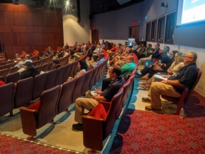 Attendees watching keynote