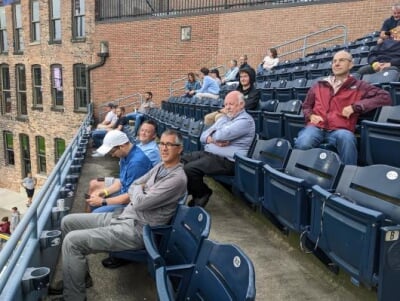 Attendees sitting in outdoor seating