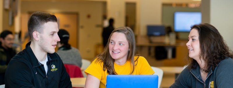 Group of students in the library.