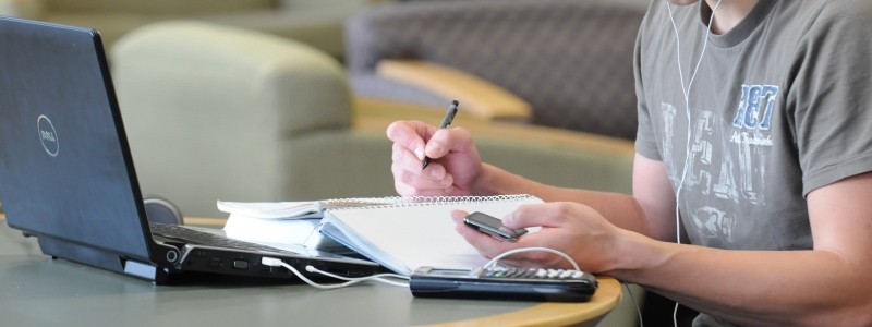 Student is studying in the library