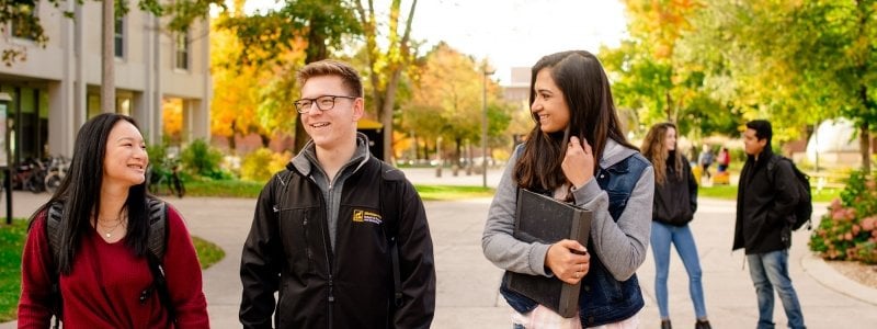 Students walking on campus.