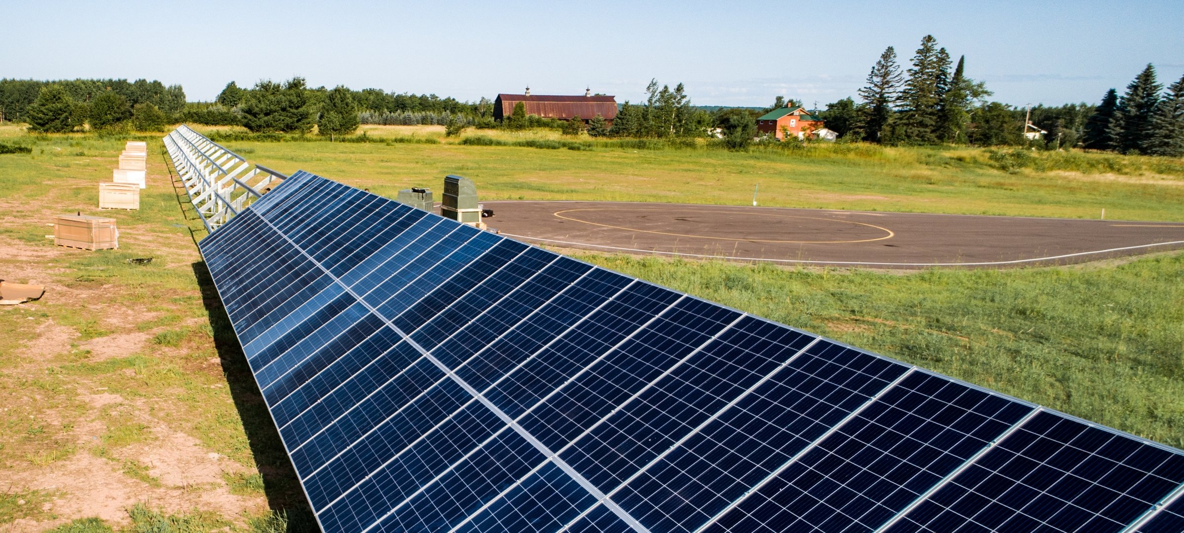 Unfinished solar panel array stretches into the horizon