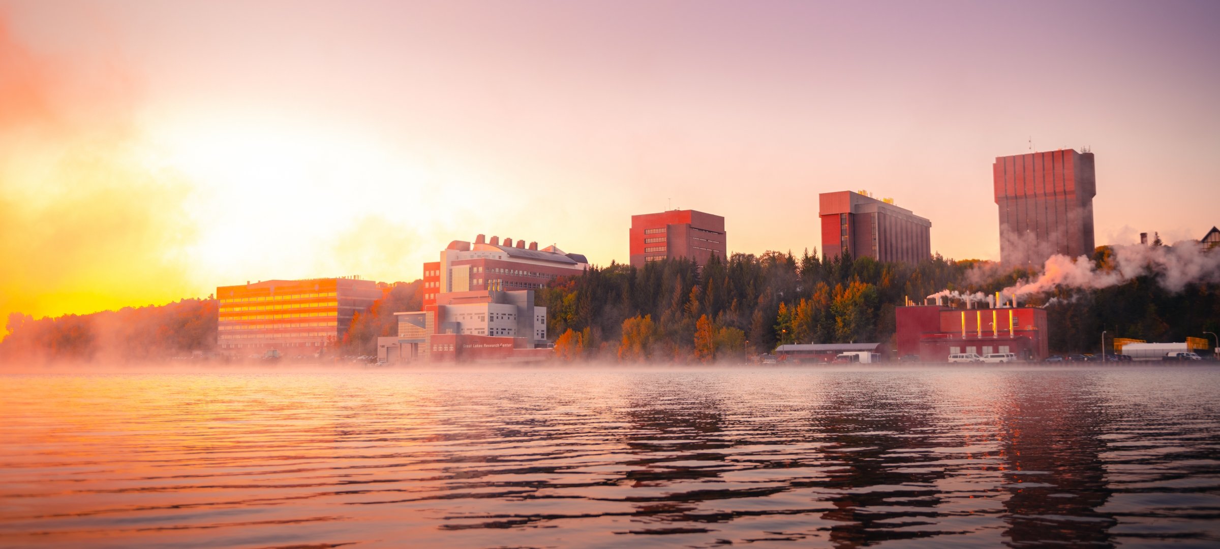 Misty morning of campus from across the Portage Canal.