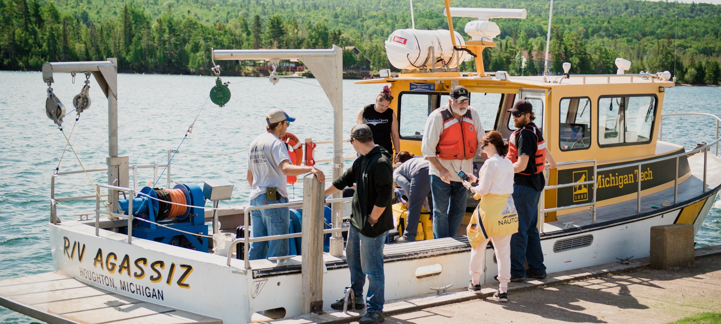 Students boarding a research vessel 