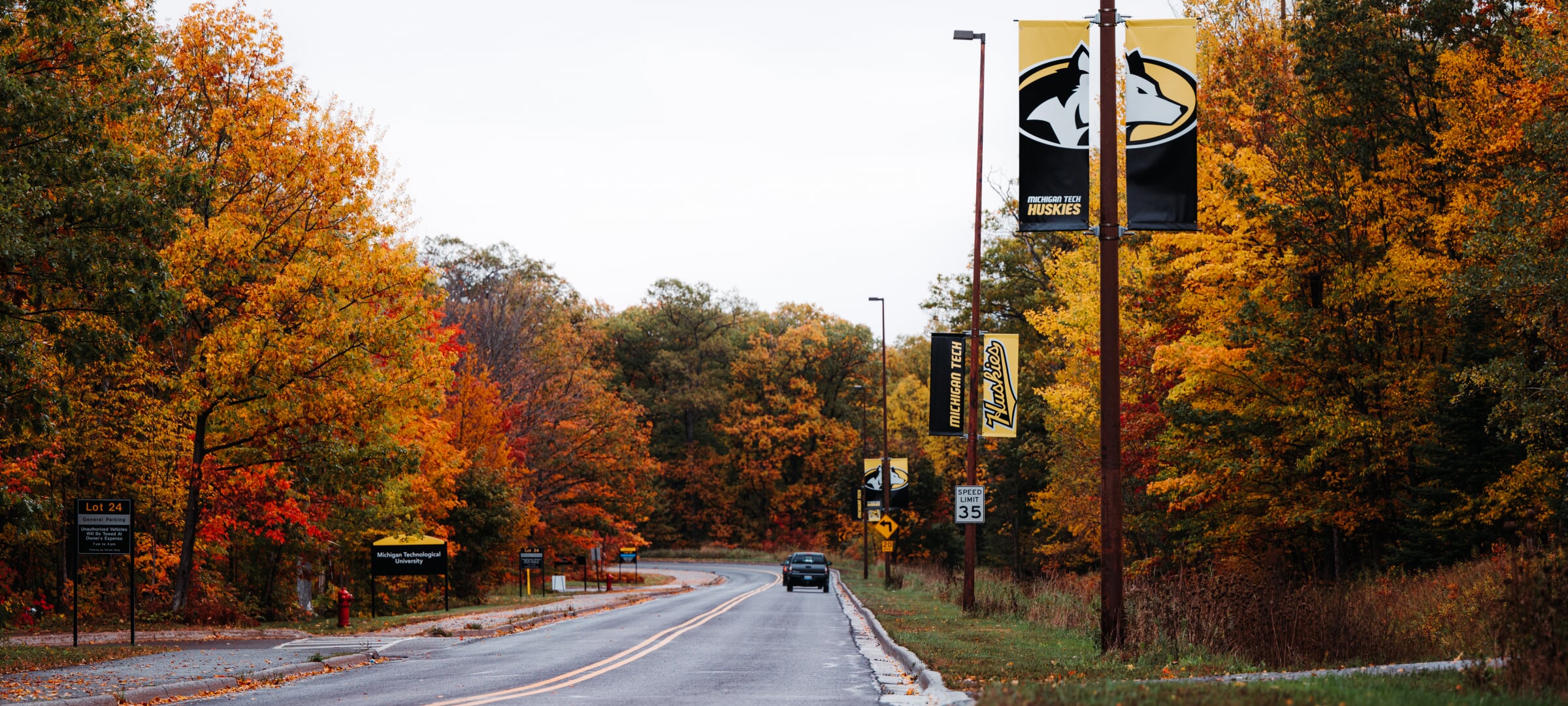 Spring break on campus with bench on the left side