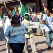 Representatives from Kenya and Ghana march in the Parade of Naitons