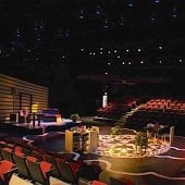 Inside the McArdle Theatre with a dressed set and lighting