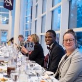 Long table of guests.