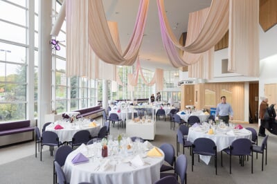rozsa lobby decorated with pink silks and gala table settings