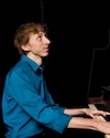 Four members of Jaztec perform in a backstage setting