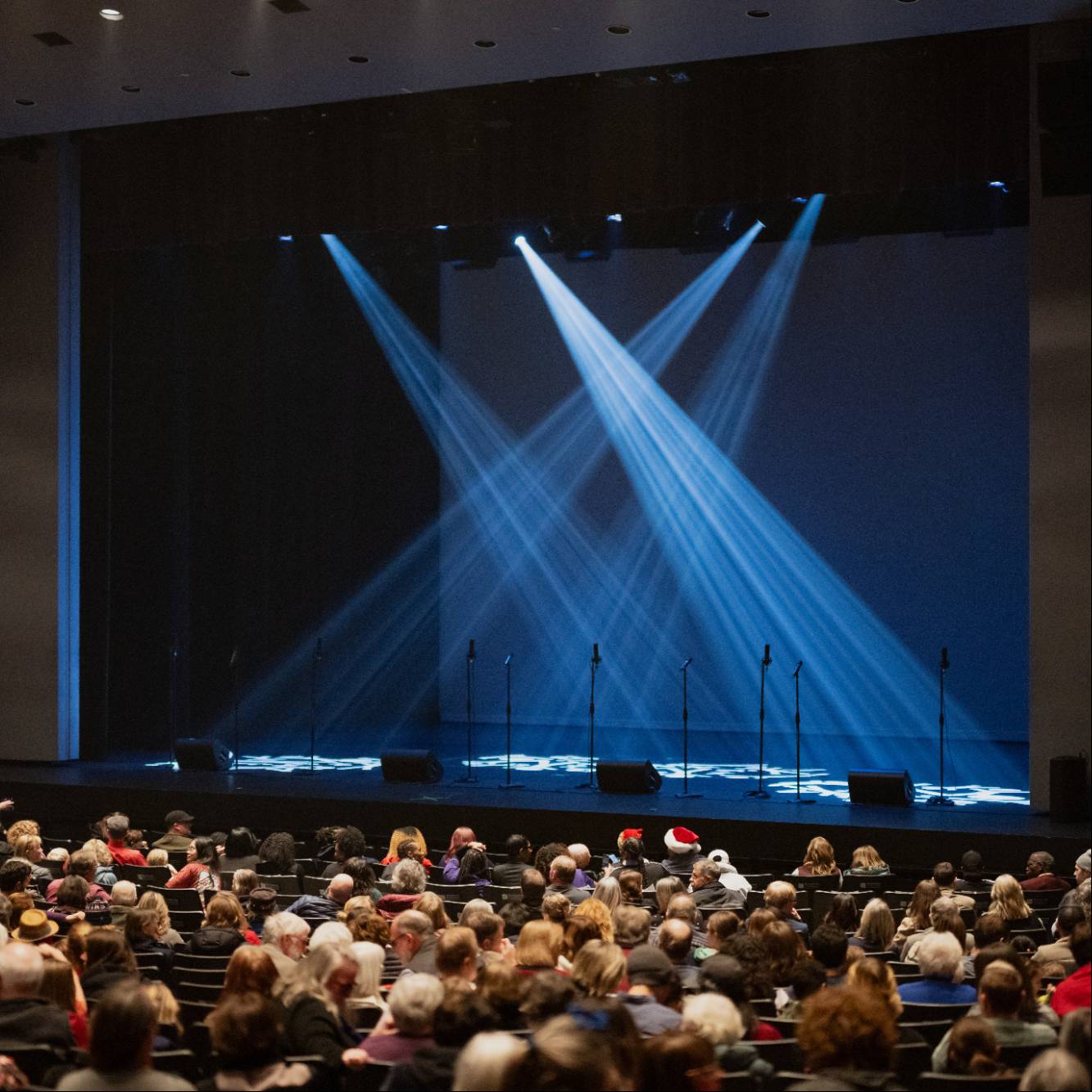 Rozsa stage beautifully lit with an audience. 