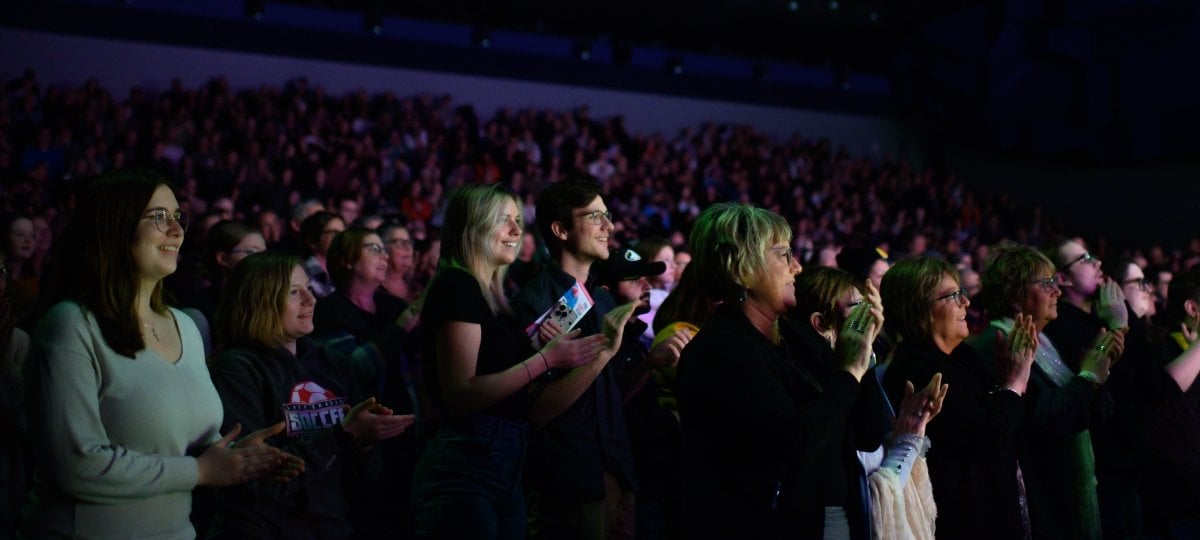 A full audience gives a standing ovation in the Rozsa