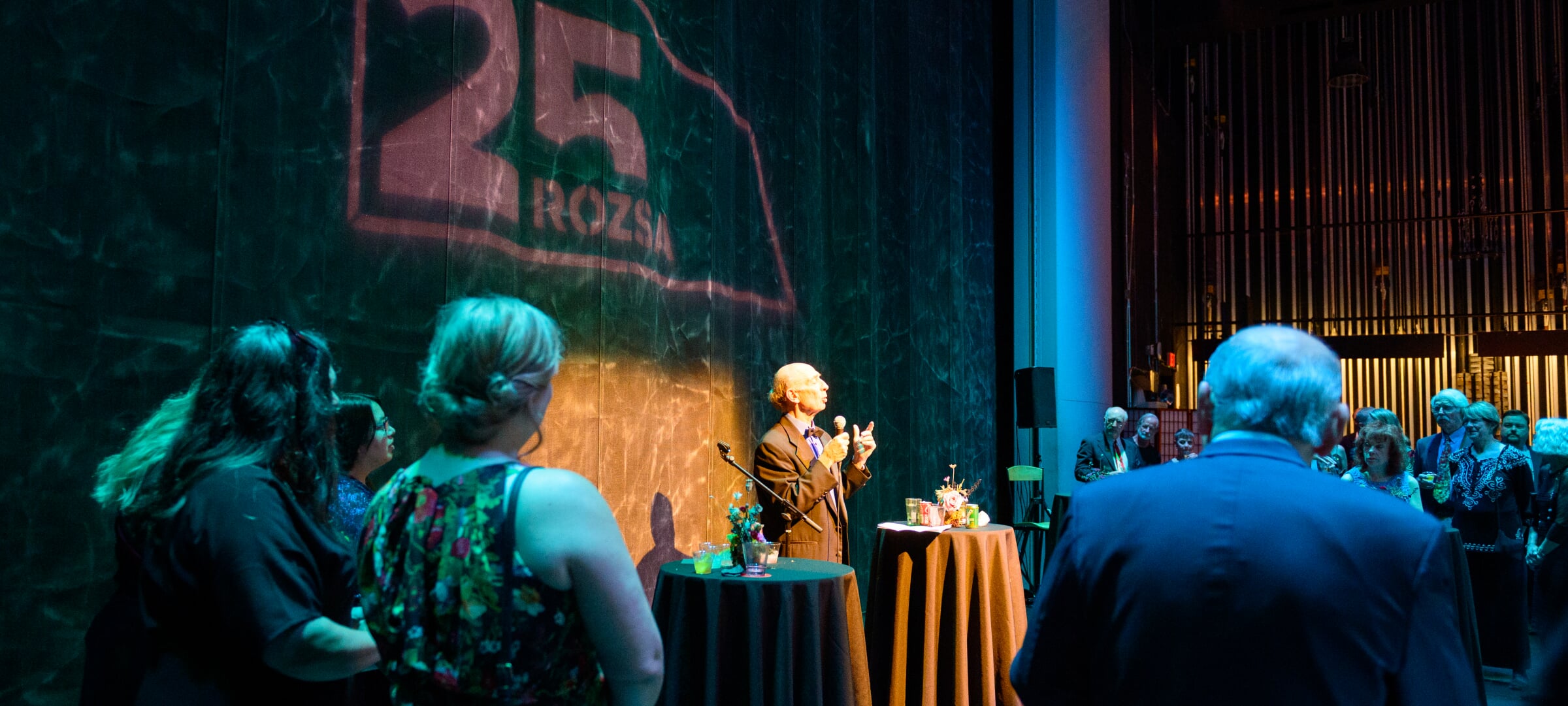 Speaker at a backstage event at the Rozsa lit up with mood lighting