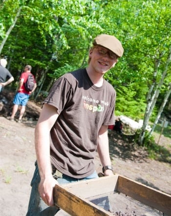 Social sciences student working outside.