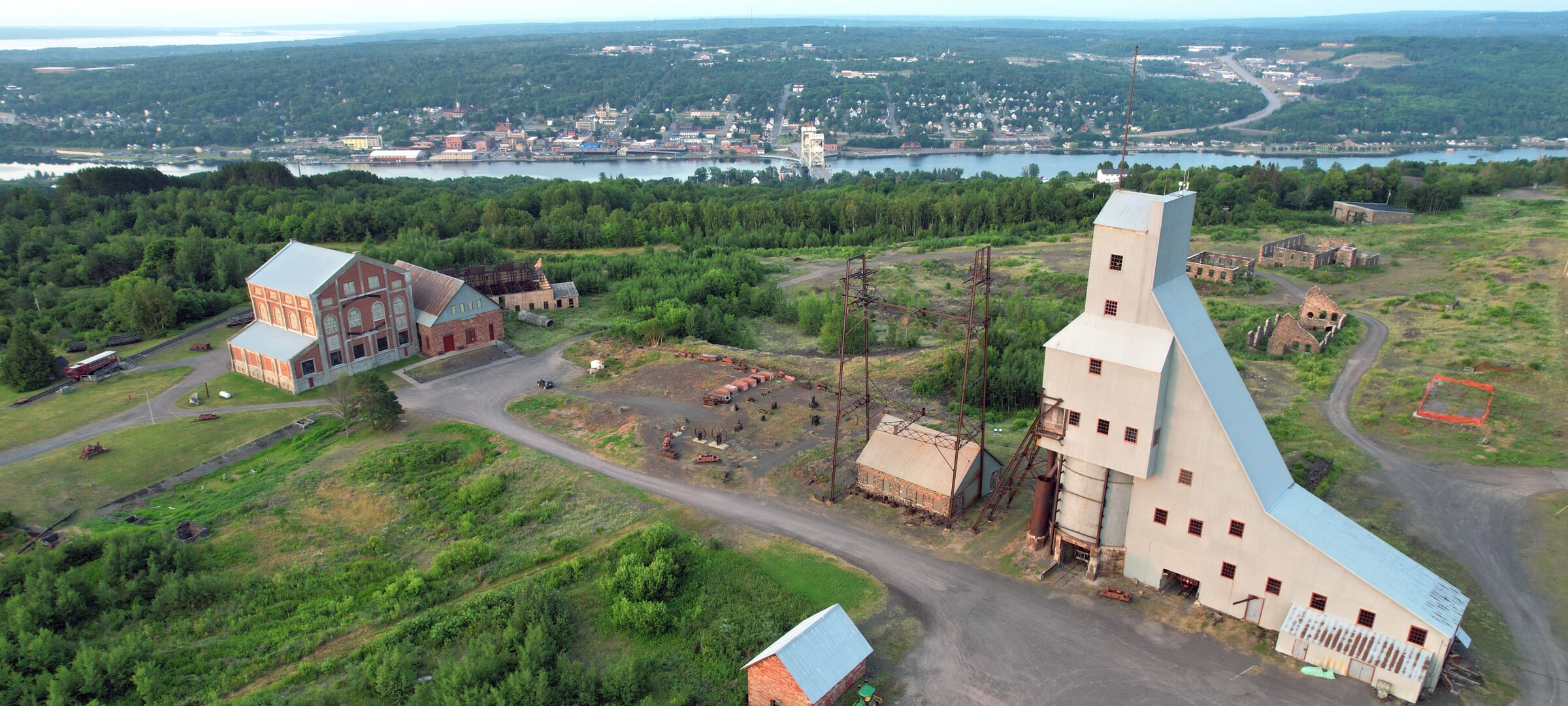 Aerial view of Quincy mine shafthouse #2 and outbuildings overlooking Michigan Tech