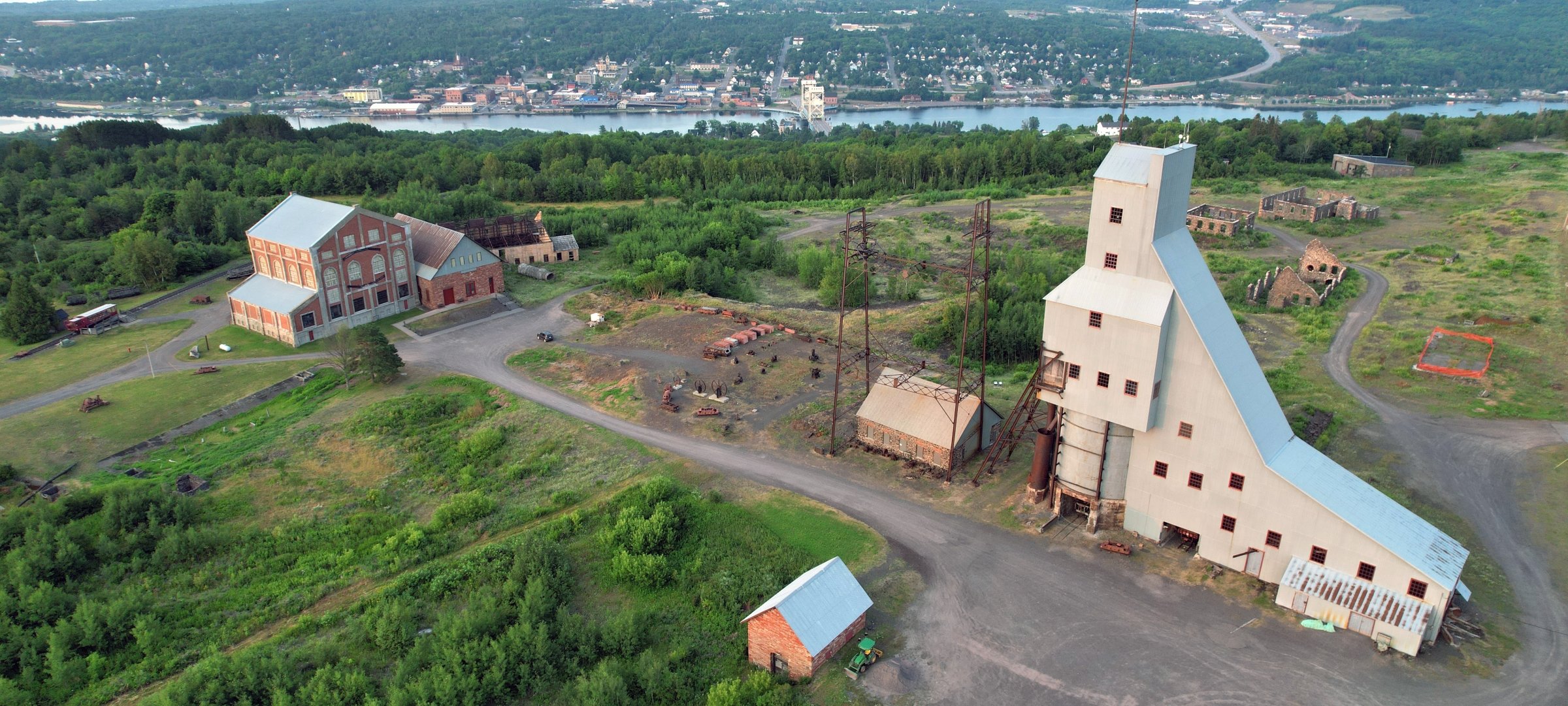 Aerial view of Quincy mine shafthouse #2 and outbuildings overlooking Michigan Tech