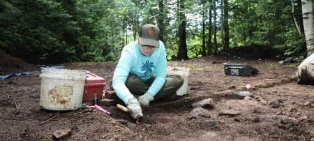 Student excavating