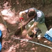 Field school student recording information