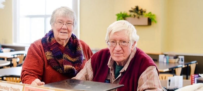 Curt and Rachel Eikenberry at the desk in Wads.