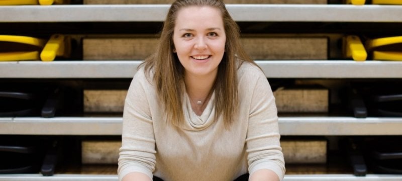 Silvie Rokosh sitting on the sidelines.