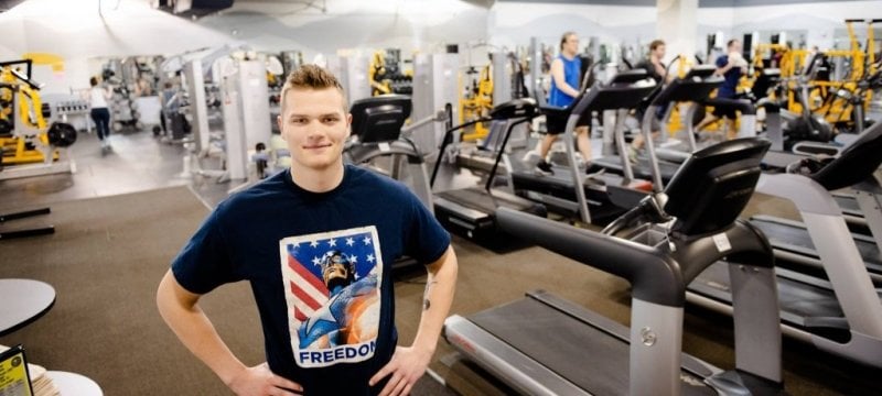 Adam Loman standing in the fitness center.