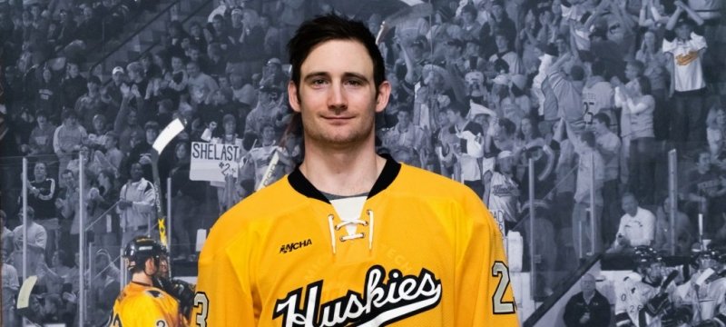 Tyler Shelast wearing a hockey jersey.