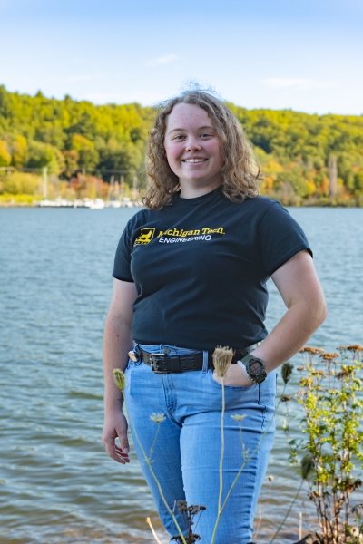 Maci Cornish, a first-year engineer studying for her 100-ton captain's license stands by the Great Lakes Research Center on the Keweenaw waterway.