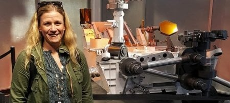 Jessica Elwell in front of the Mars Curiosity Rover mockup at NASAâ€™s Jet Propulsion Laboratory. The rover is in the same class as the Mars Perseverance Rover, that carried the experimental device MOXIE aboard to successfully convert carbon dioxide to oxygen. (All images courtesy Jessica Elwell)