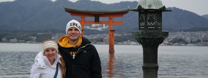 Students in front of lake in China