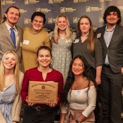 Members of MUB Board pose with their award for Program of the Year