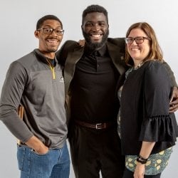 Nathan Shaiyen poses with Susan Liebau and another student.