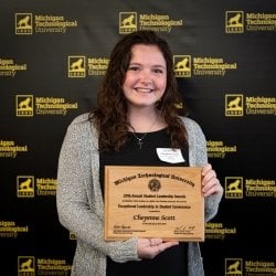 Cheyenne Scott poses with her award.