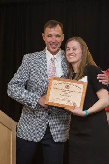 Les Cook givng an award
