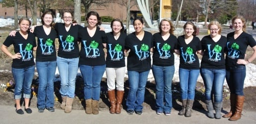 Sorority sisters in front of wind chime