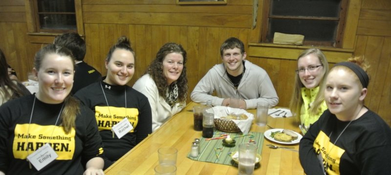 2014 Leadershape participants sitting at a table.