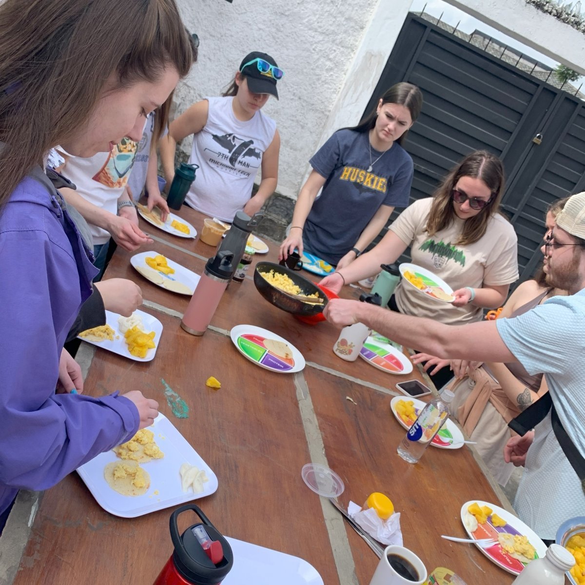 Ecaudor participants prepare and enjoy a family meal with local fruits