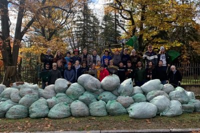 Phi Kappa Tau with over 30 bags of leaves raked from a resident's yard