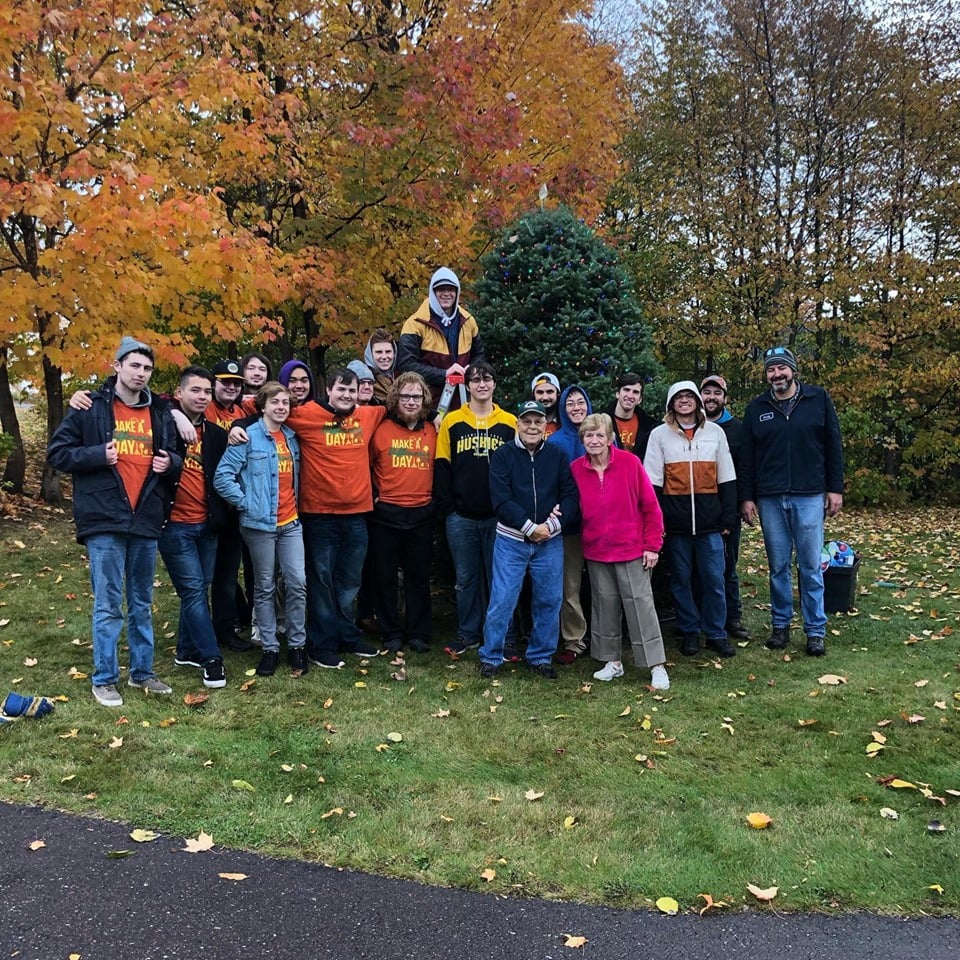 MTU Students Pose with Community Members at Make a Difference Day 2019