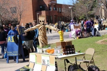 Student at various tables around the Memorial Union.