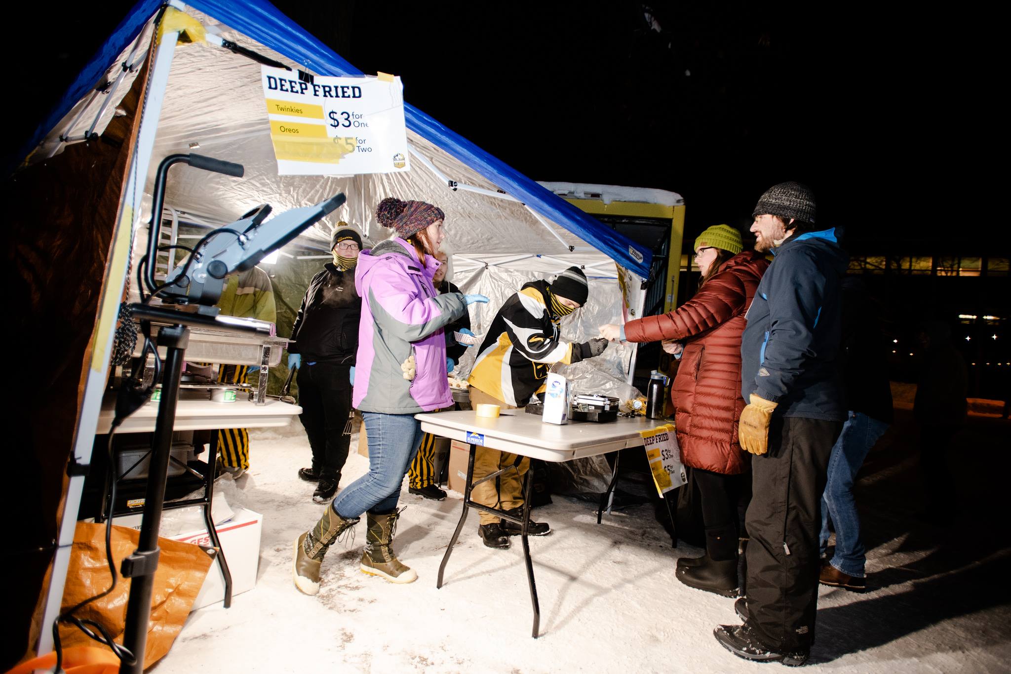 Students selling fried sweets during Winter Carnival
