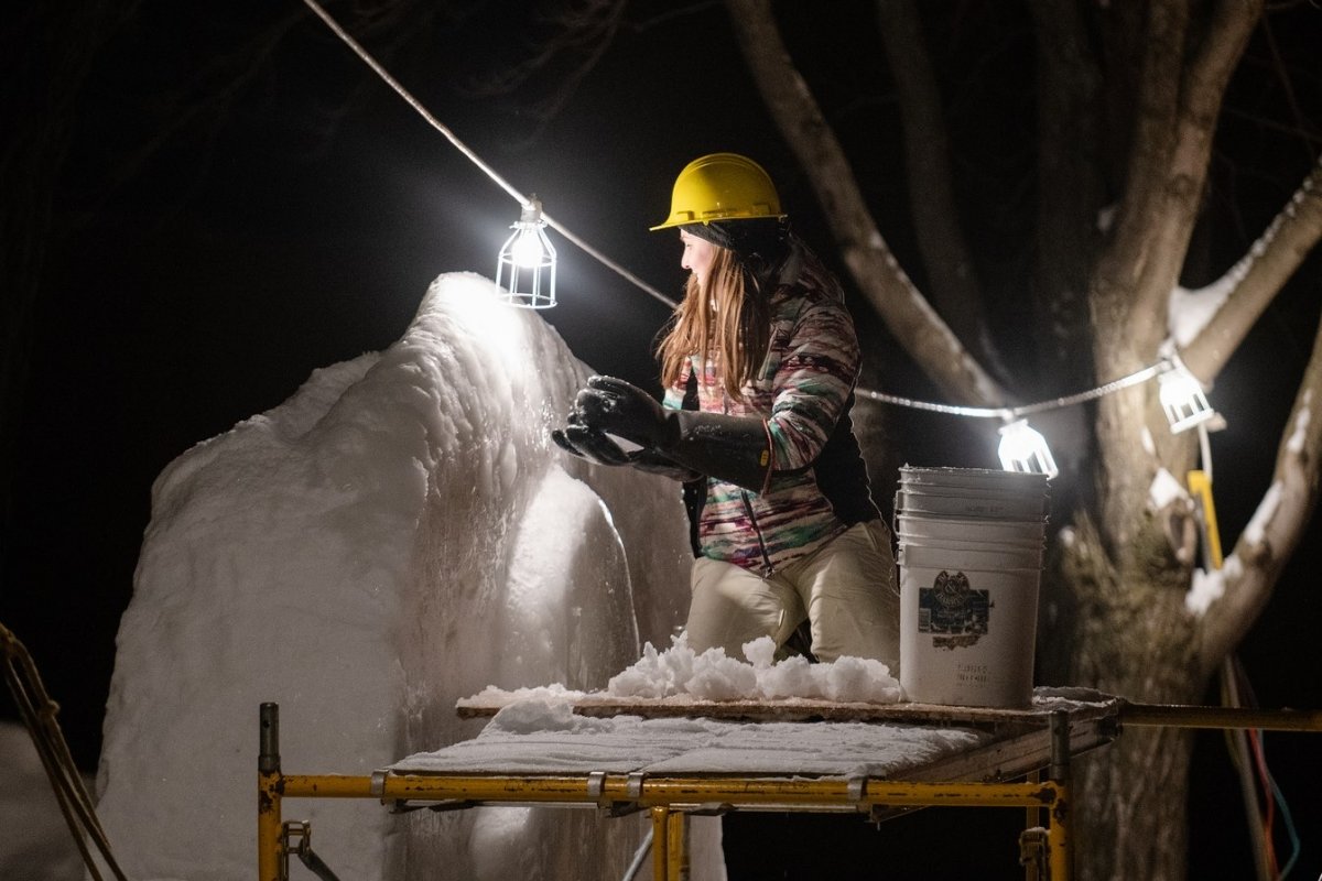 Student building a snow statue