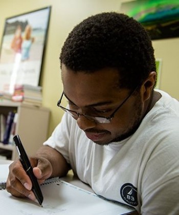 student taking notes