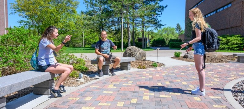 Students talking in plaza