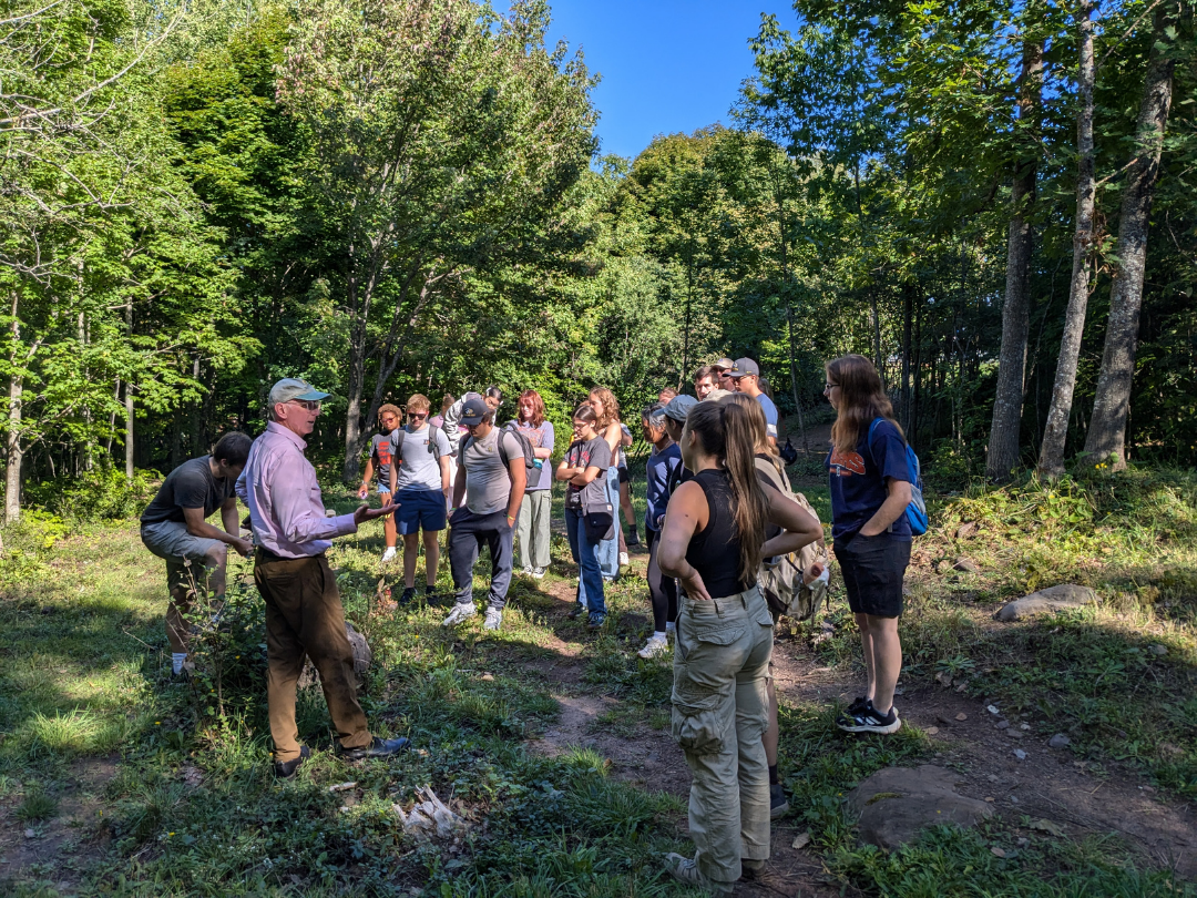 Students taking a guided hike