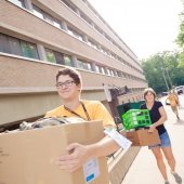 Students holding boxes