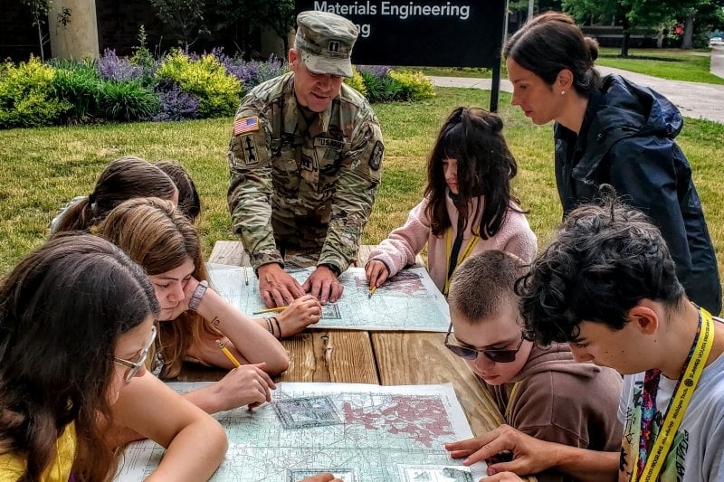 Students learn orienteering from a VIP instructor and ROTC
