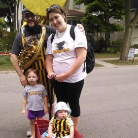 Young family at cherry parade