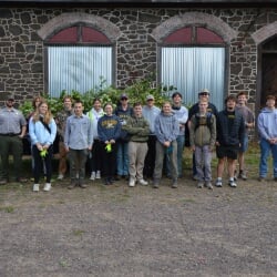 Group of Thompson Scholars posing after volunteering with KNHP