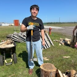Thompson Scholar with axe