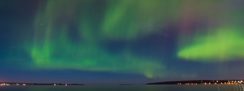 Northern Lights viewed over the Portage Canal in Houghton, MI.